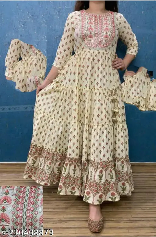 Cream rayon printed gown with three-quarter sleeves, exquisite embroidery. M: Bust 38in, L: Bust 40in, XL: Bust 42in, XXL/4XL: Bust 44in. India-made fashionwear