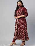 Red viscose rayon floral boat kurtas for women, showcasing front slit, mandarin collar, gota lace & three-quarter sleeves. Indian traditional style, soft fabric for comfortable wear