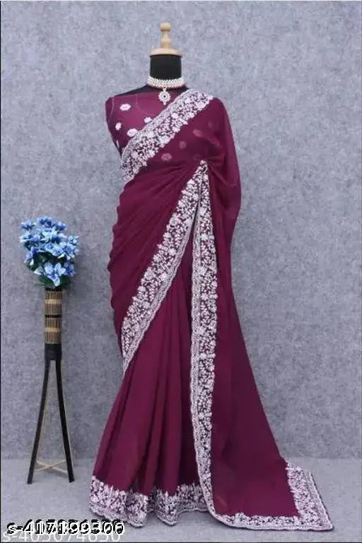 Maroon lace saree with detailed embroidery