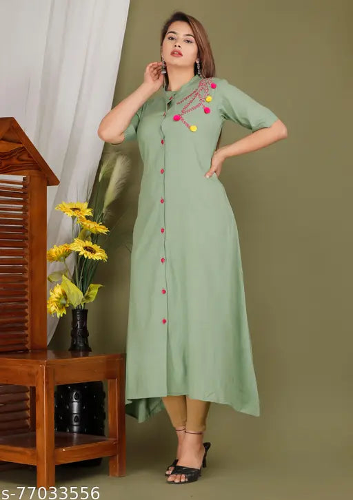 Green embroidered kurta dress with black buttons