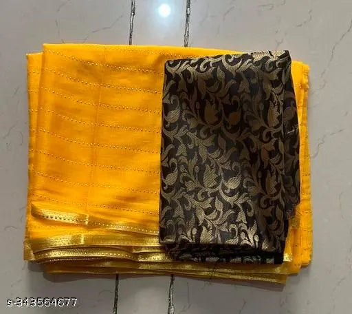 Yellow Georgette saree with separate Italian silk blouse, gold foil embellished, trending for festive occasions like Diwali or Karwa Chauth