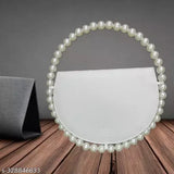White pearl choker, round, with multiple strands of round pearls on a gold-tone ring