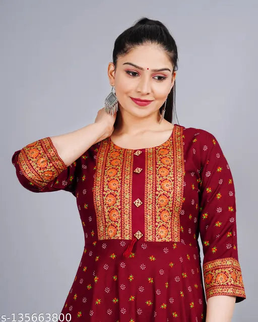 Red and gold patterned rayon kurtee women's casual wear
