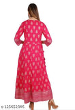 Red, cotton ankle-length maxi dress with long sleeves and flared skirt