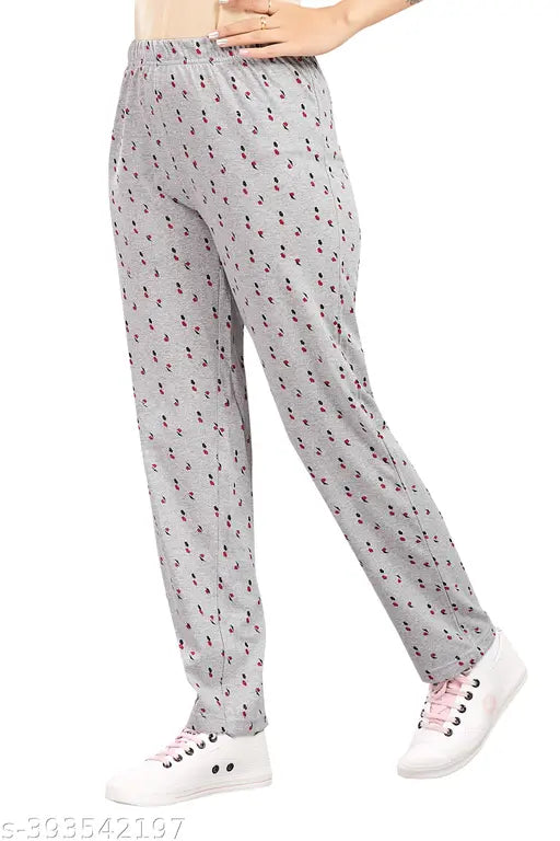Women's blue pajama pants with red floral pattern, elastic waist