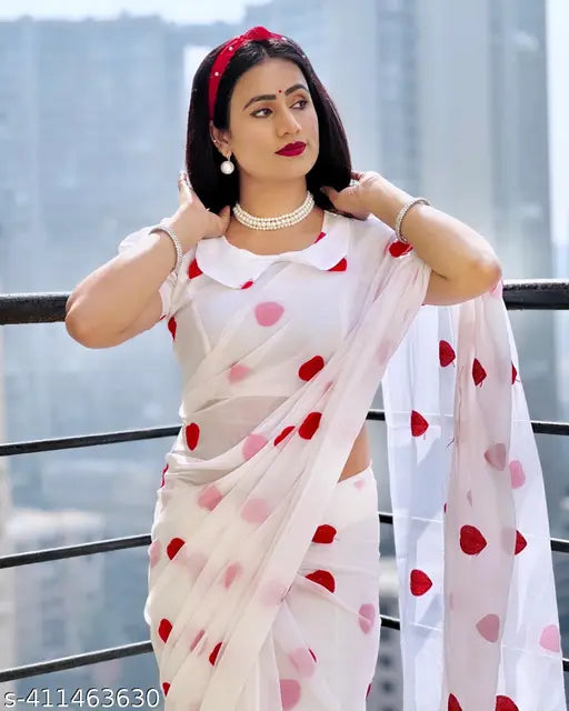 White saree with red heart pattachis, traditional Indian festive wear