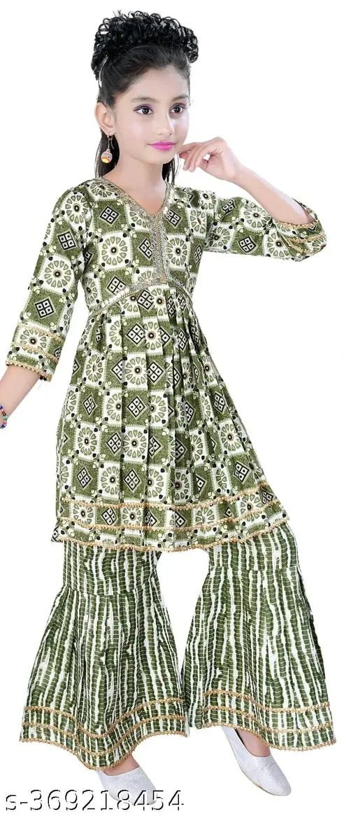 Cotton Alia cut pant set for girls - vibrant printed anarkali style with sharara bottom, embellished neckline, and handblock design. Fashionable kids traditional clothing for festive wear, aged 2-11 years. Made in India