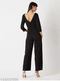 Black polyester jumpsuit with belt, solid design, three-quarter sleeves, imported from India. Soft, stretchable, and suitable for all weather types