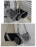 Black, studded, round sling bag with chain handles