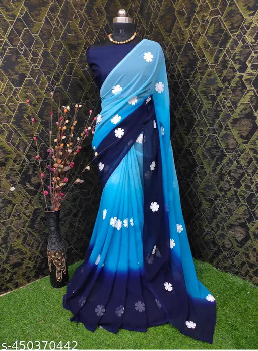 Georgette embroidered saree in neutral and white with floral print, perfect for parties or special occasions. This versatile and comfortable saree features intricate embroidery that makes it a standout piece. Style it with various blouses for added appeal. Ideal for expanding your wardrobe with unique items. Sizes: Free Size (Saree length size: 5.4 m, Blouse length size: 0.8 m). Origin: India