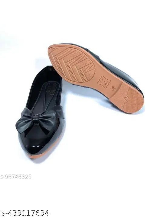 Black dress shoe with bow detail
