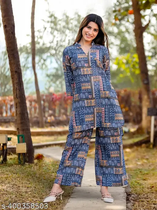Indian hand-printed women's kurta set, long sleeves and trousers, vibrant design for western wear fashion