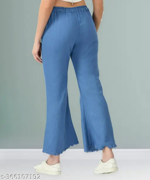 Light blue stretchable flared denim jogger jeans with elastic waist, ankle cuffs and mid-waist. Plus size