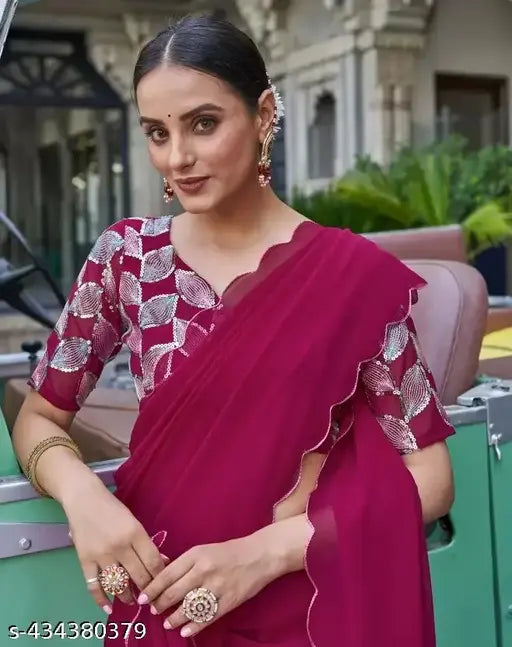 Pink georgette saree with detailed leaf design