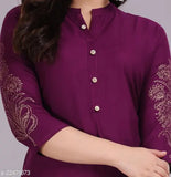 Colorblocked rayon Alisha Refined Women's kurta set with palazzo bottoms, featuring three-quarter sleeves and hand block gold print