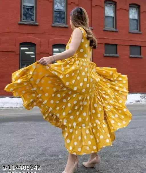 Acrylic polka dot printed flared sleeveless yellow kurta, ideal for daily wear or special occasions. Sizes: S, M, L, XL, XXL by LEELA Emporium Jaipuri Kurtis