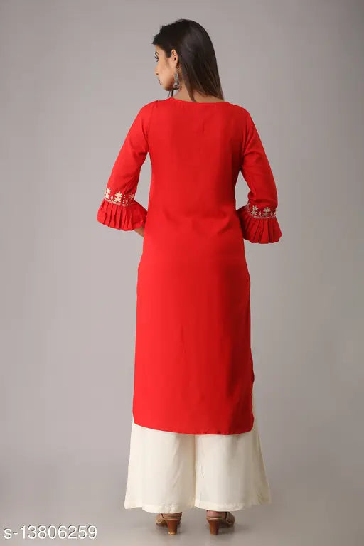 Rayon embroidered kurta set with solid pocket palazzos, India-made, featuring beautiful floral work on three-quarter sleeve kurta and single side palazzo