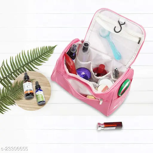 Pink fabric net travel pouch for women, ideal for organized toiletries and travel essentials