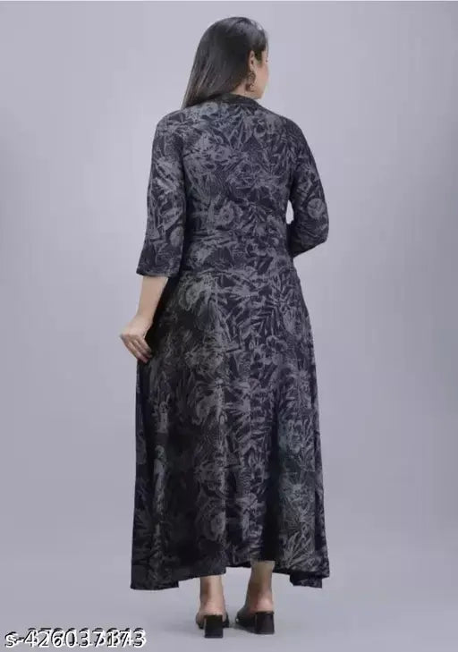 Black rayon three-quarter sleeve kurti by Cham Cham, printed combo pattern, Indian fashion wear on mannequin