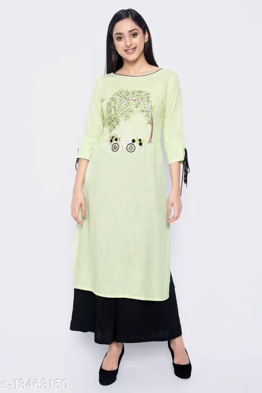 A woman in a long, embroidered kurta with a floral pattern and a straight neckline
