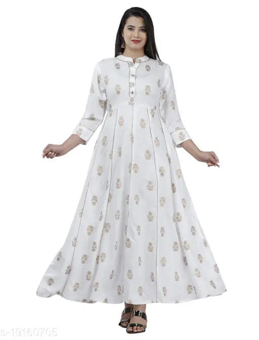 White long-sleeved dress with patterned trim