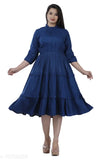 Dark blue ruffled midi dress with 3/4 length sleeves, knee length skirt