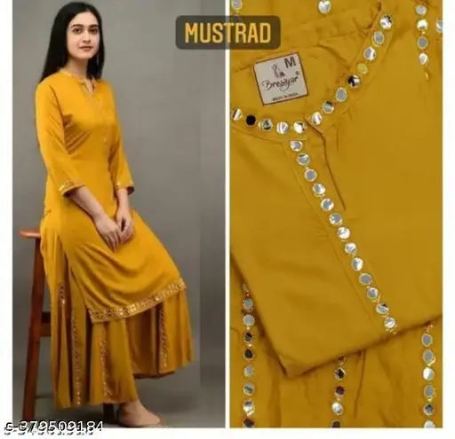 Rayon kurta with palazzos bottomwear, mirrored embellishments on heavy rayon fabric, three-quarter sleeves, classical Indian design