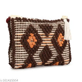 A multicolored crossbody sling bag with a tassel, featuring a floral pattern