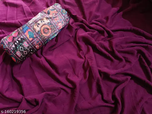 Magenta saree with geometric patterns and black border