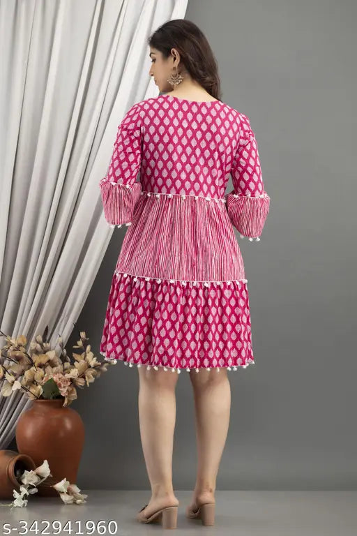 Pink viscose rayon dress with three-quarter sleeves, printed combo, size S (36in bust, 28in length). New style pink dress for a fresh look, suitable for office, home, and festive occasions. Comfortable and easily washable in machine or by hand. Made in India