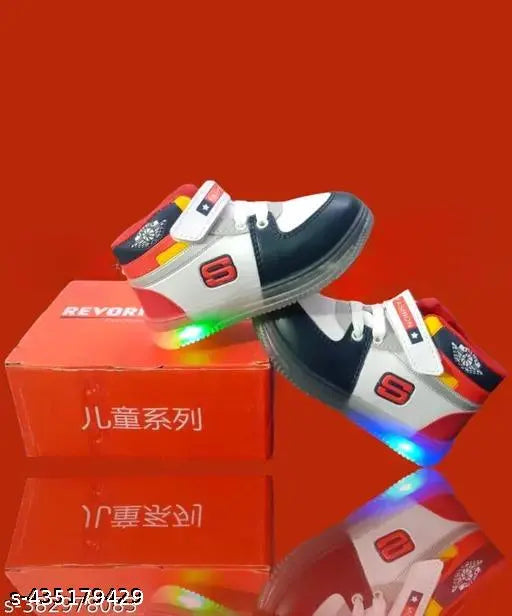 Black and white shoes, sporty design, red laces