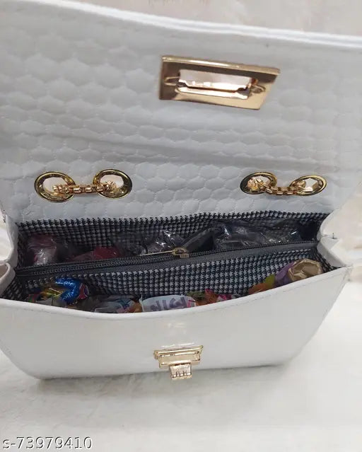 White crocodile skin slingbag with multiple pockets and a strap