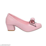 Pink suede ballet flats with rounded toe, buckle ankle strap
