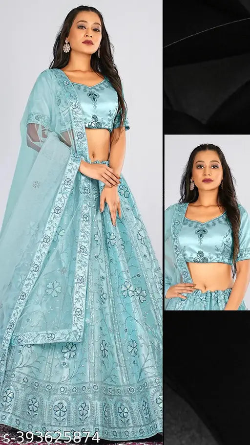 Elegant sky blue net semi-stitched lehenga choli & dupatta, embellished with golden zari work. Perfect for weddings, events, India-made