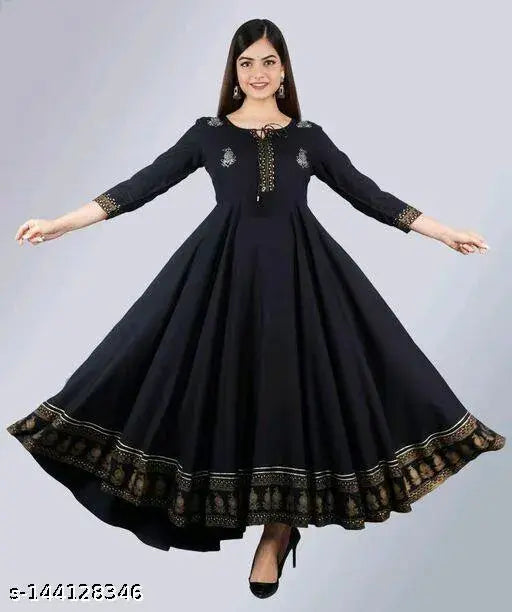 Gold rayon Anarkali gown, three-quarter sleeves, printed combo. Women's ethnic wear in soft colors, perfect for casual wear