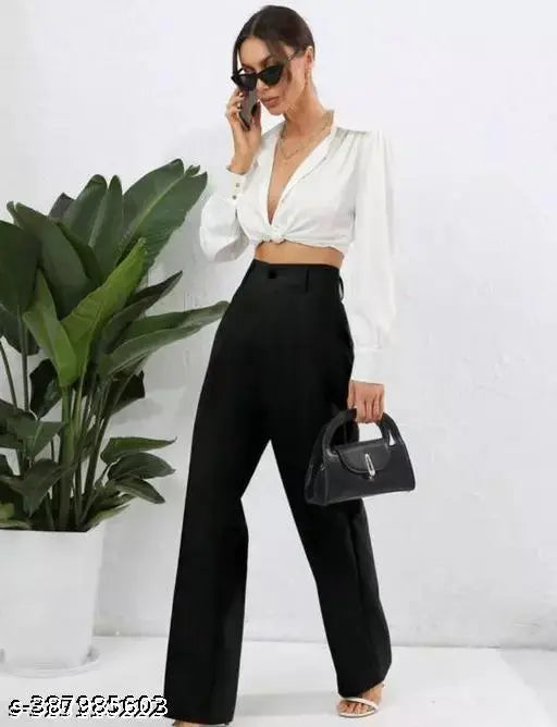 Black high waist trousers with a pointed toe and side pocket