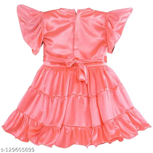 Peach satin blend frock, silver Kraft material, with ruffled collar and cuffs