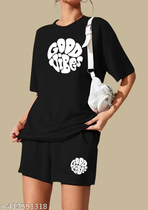 Black pure cotton printed night suit set for women, featuring a top and shorts with half sleeves and free-fitting design. High-quality Indian cotton for all-night comfort