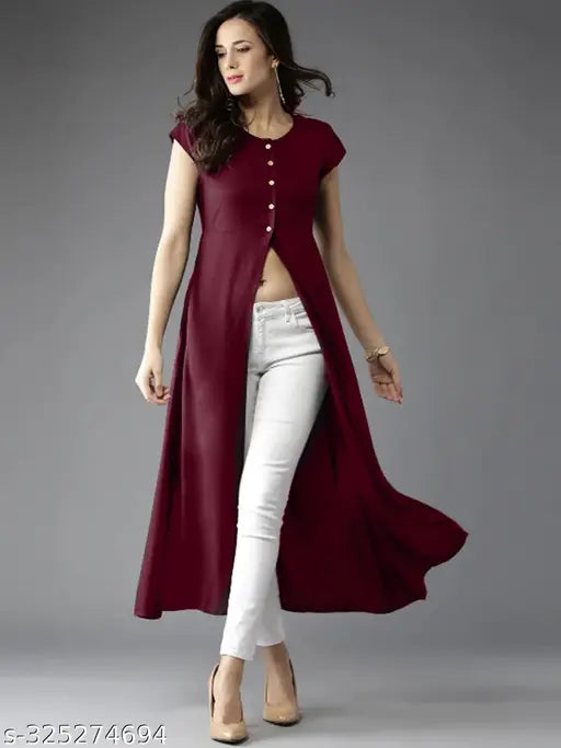 A woman in a maroon sleeveless kameez with a V-neck design
