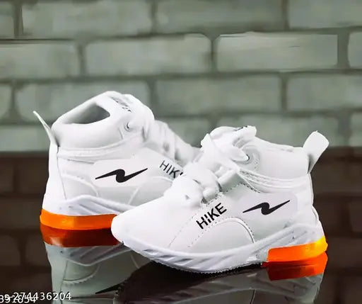White sneakers with orange accents, lace-up design