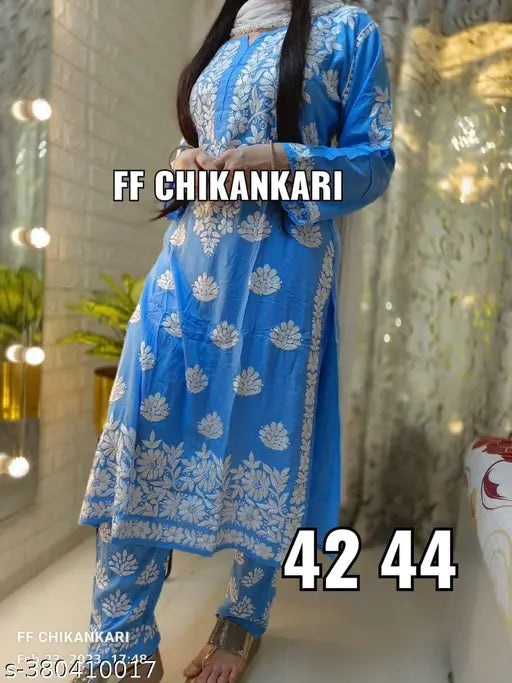 Rayon Chikankari work kurta with plazzo, embroidered net and three-quarter sleeves. Single size options: M (38in bust), L (40in bust), XL (42in bust/15in shoulder/38in waist/44in length), XXL (44in bust/16in shoulder/40in waist/44in length). India-origin Indian ethnic wear
