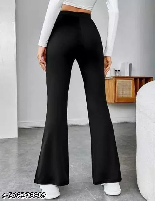 Black high-waisted flared pants with white side stripe