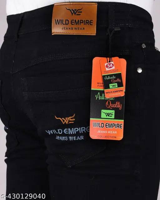 Black mens denim pants tagged with 'Wild Empire' label and zip closure