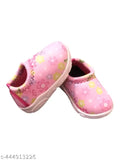 Pink baby shoes with flower design, soft rubber soles