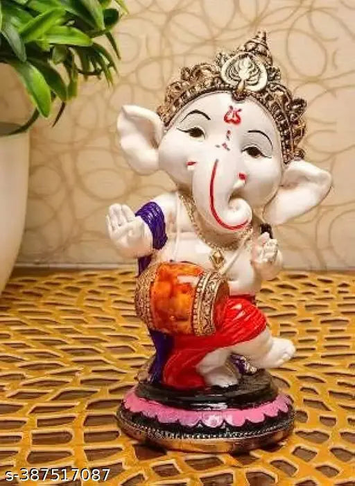 Resin Ganesha idol, 6cm tall Dholak statue from India