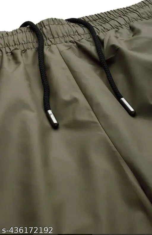 Olive green lose-cargo trousers with drawstring waistband, stylish design