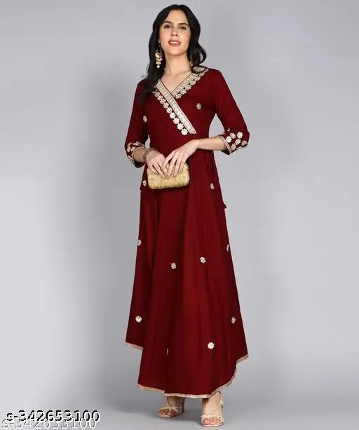 Maroon embellished Rayon Anarkali kurta with three-quarter sleeves, traditional Indian ethnic gown for festive events