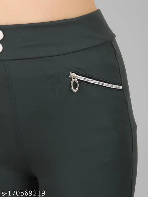 Solid green polyester pocket jegging for women & girls, stylish fit and deep green color on model