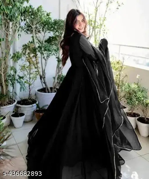 Black georgette anarkali kurti with dupatta, long sleeves and midi length, ideal for parties and festivals