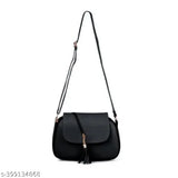 Black leather shoulder bag with tassel